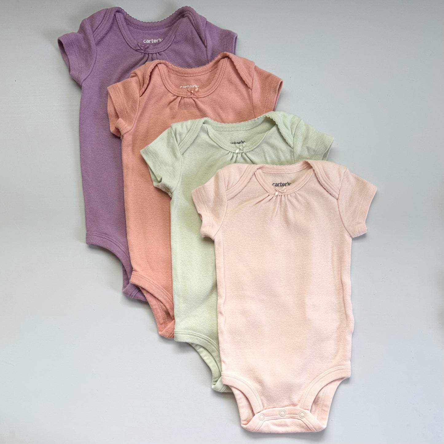 4 pcs. Carter’s bodysuit (3 months)