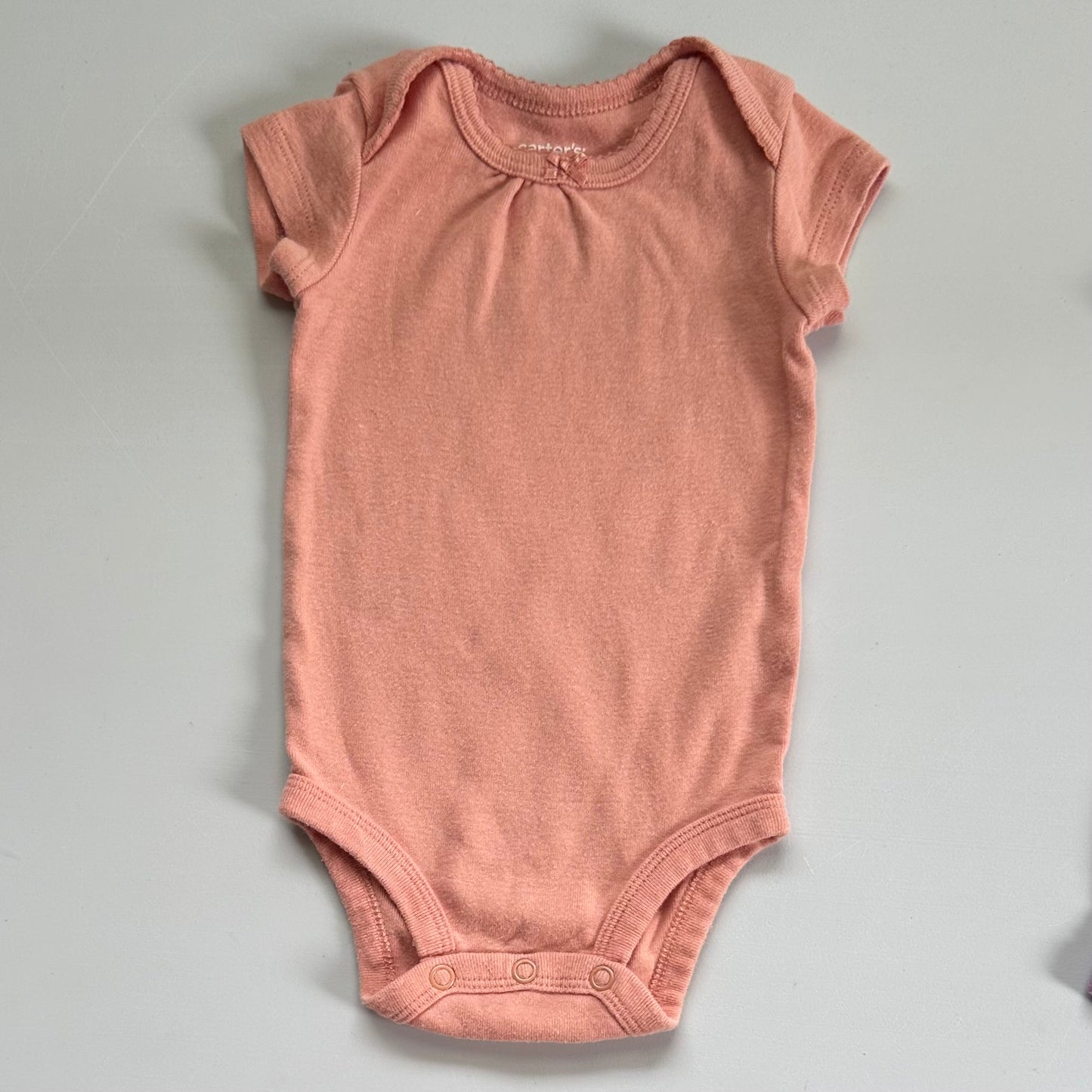 4 pcs. Carter’s bodysuit (3 months)